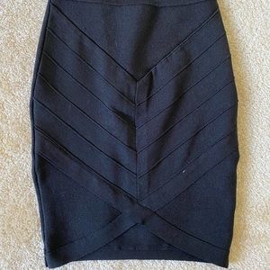 Bebe black tulip high waisted mini skirt size small fits like XS